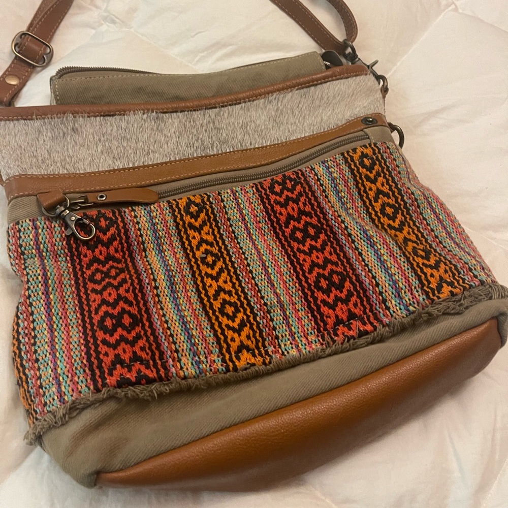 Myra bag canvas style with hair on hide.